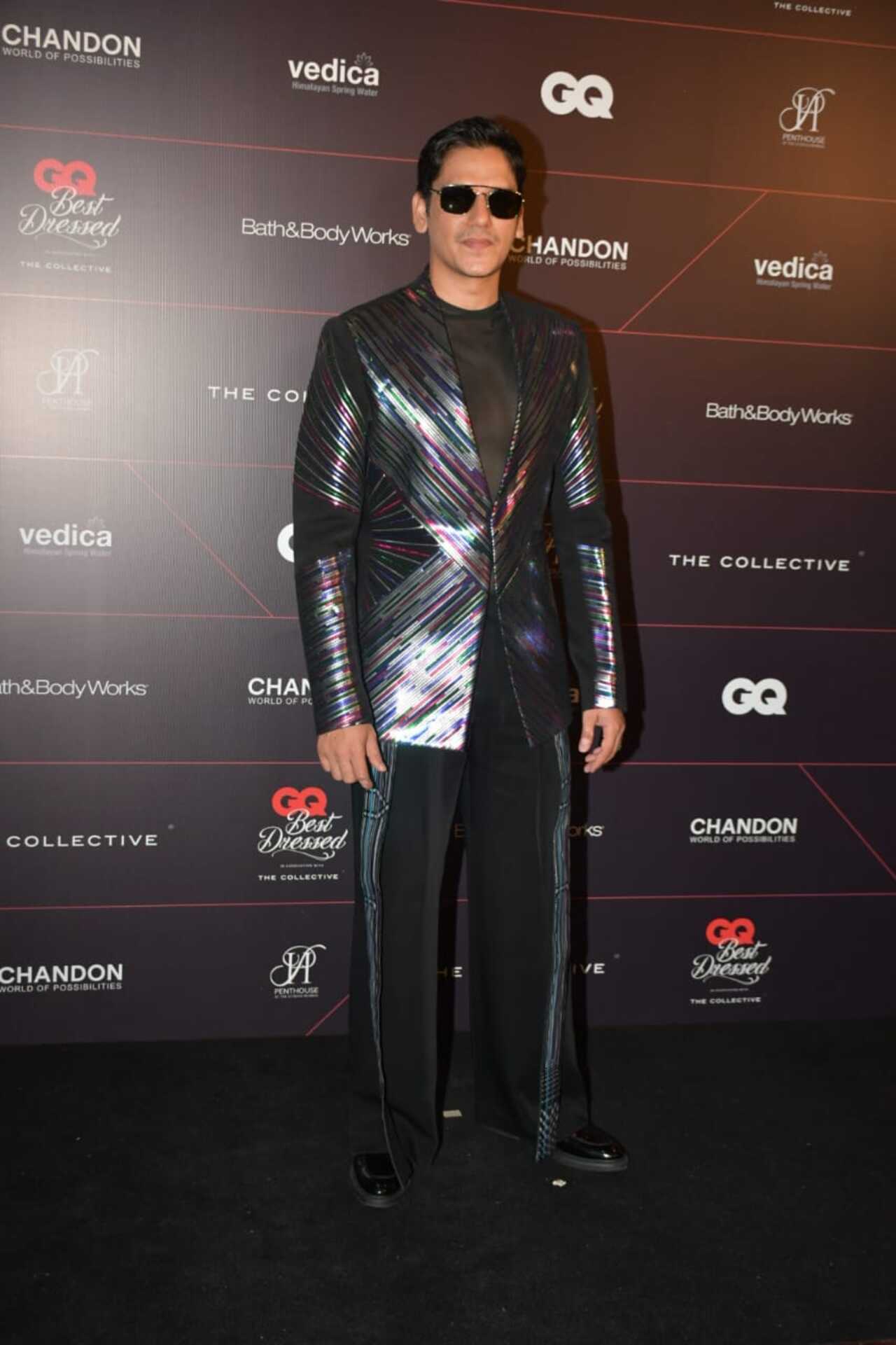 Vijay Varma wore a multicoloured jacket along with black pants and T-shirt